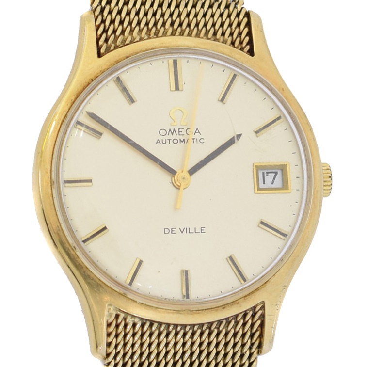 A 9ct gold Omega De Ville automatic watch, cal 1012, the circular signed dial with baton hour markers, date aperture to 3 and outer minutes track, movement signed and numbered 36182583, within a 9ct gold case bearing hallmarks for London 1976, numbered 1016 1625422, to the 9ct gold bracelet with folding clasp, case diameter 33mm, gross weight 63.6g.